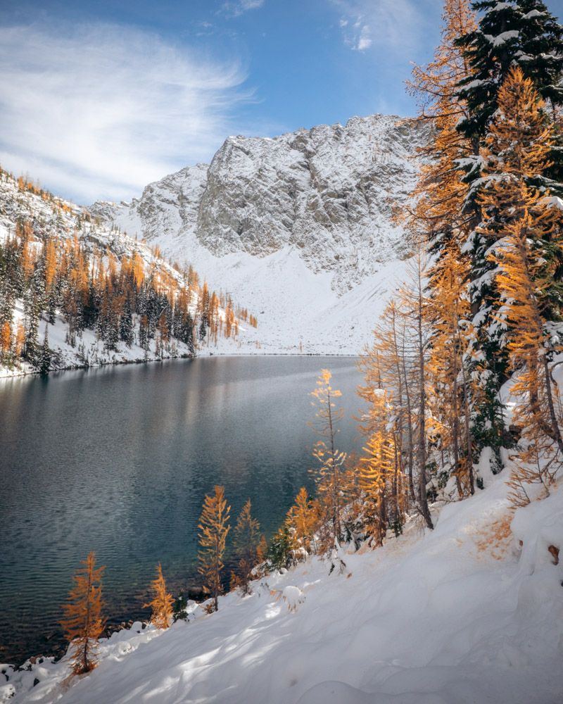 Blue Lake in the Fall with golden larches and the first snow of the season